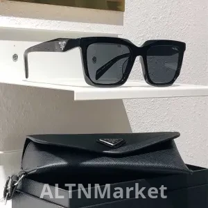 Солнцезащитные очки Prada